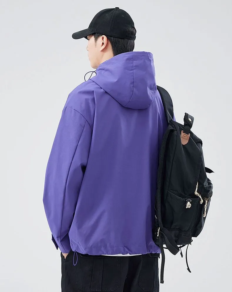 Waterproof Solid Color Raincoat Featuring a Drawstring Hem and Cargo Pockets