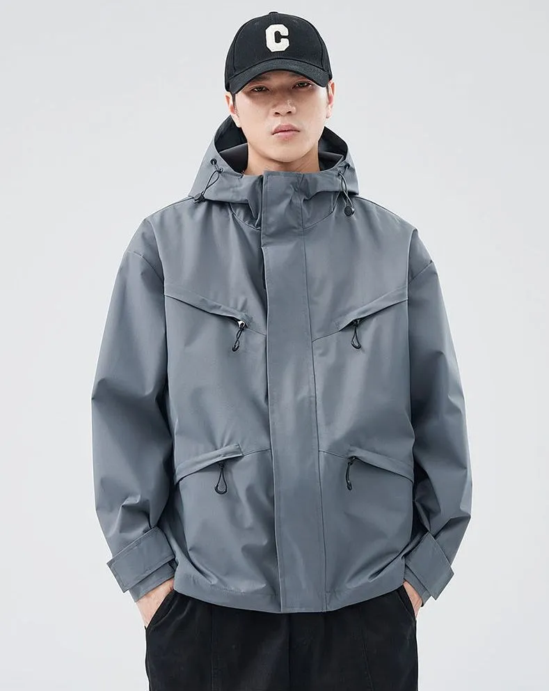 Waterproof Solid Color Raincoat Featuring a Drawstring Hem and Cargo Pockets