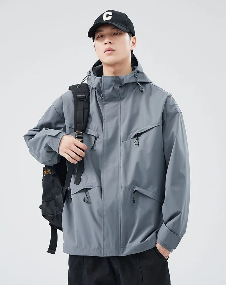 Waterproof Solid Color Raincoat Featuring a Drawstring Hem and Cargo Pockets