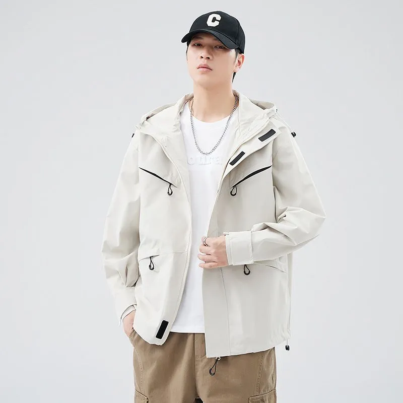 Waterproof Solid Color Raincoat Featuring a Drawstring Hem and Cargo Pockets