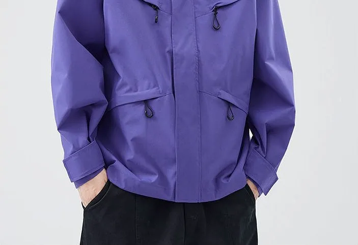 Waterproof Solid Color Raincoat Featuring a Drawstring Hem and Cargo Pockets