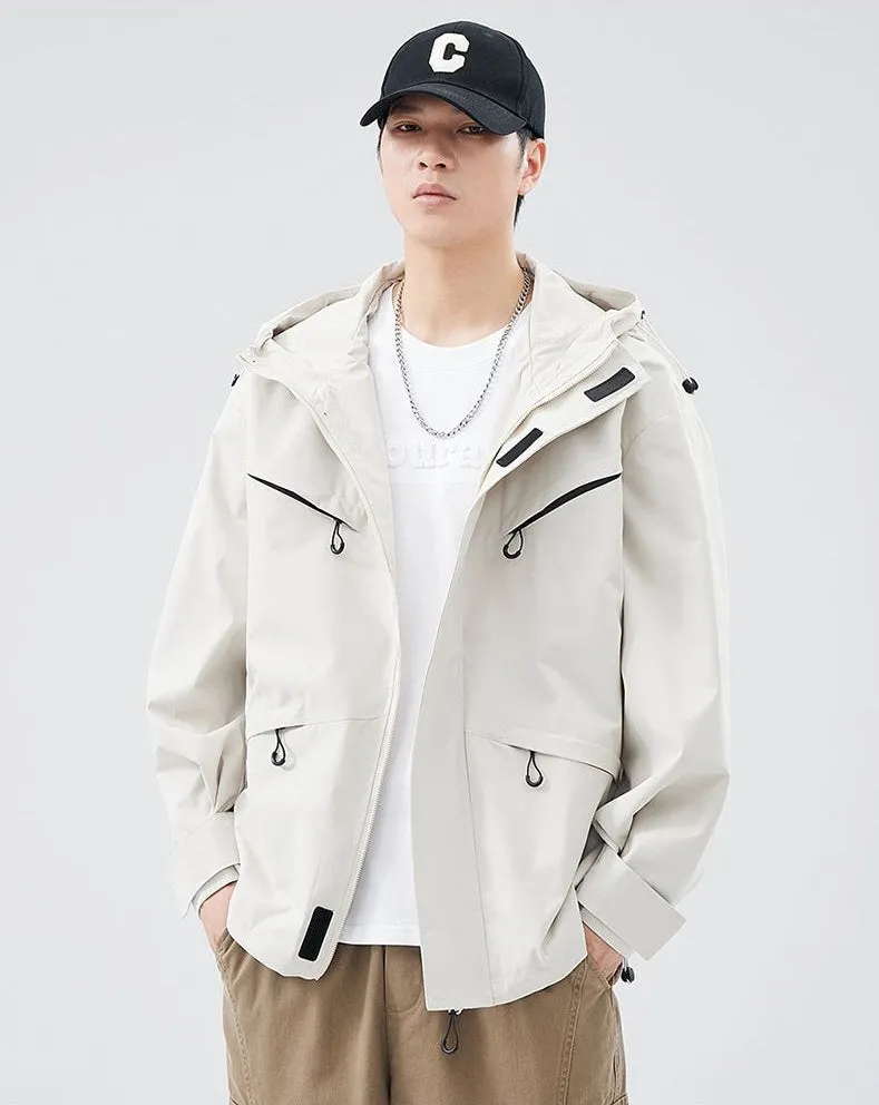 Waterproof Solid Color Raincoat Featuring a Drawstring Hem and Cargo Pockets