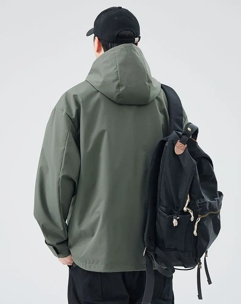 Waterproof Solid Color Raincoat Featuring a Drawstring Hem and Cargo Pockets