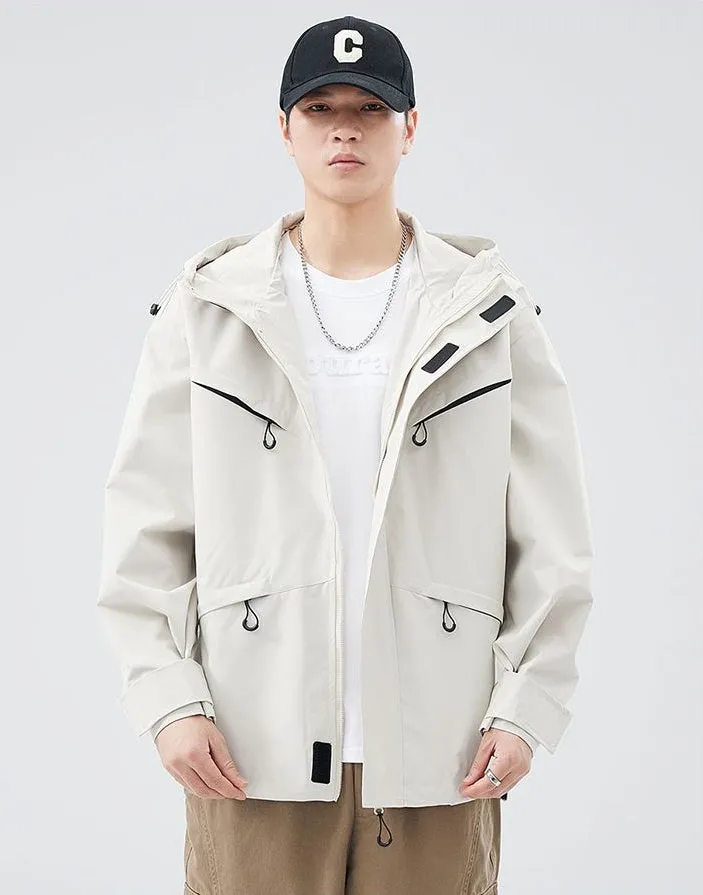 Waterproof Solid Color Raincoat Featuring a Drawstring Hem and Cargo Pockets