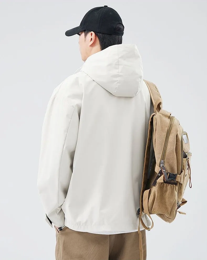 Waterproof Solid Color Raincoat Featuring a Drawstring Hem and Cargo Pockets