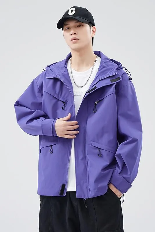 Waterproof Solid Color Raincoat Featuring a Drawstring Hem and Cargo Pockets