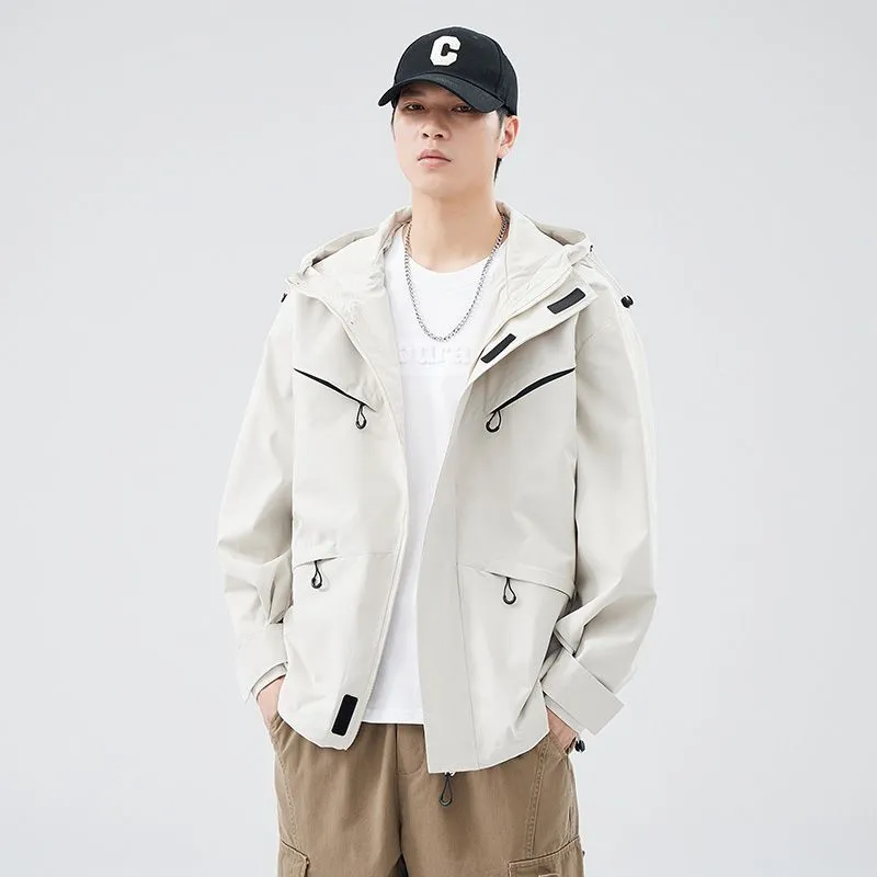 Waterproof Solid Color Raincoat Featuring a Drawstring Hem and Cargo Pockets