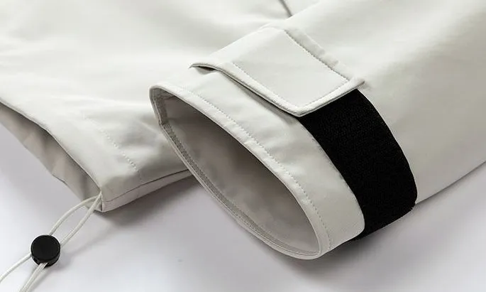 Waterproof Solid Color Raincoat Featuring a Drawstring Hem and Cargo Pockets